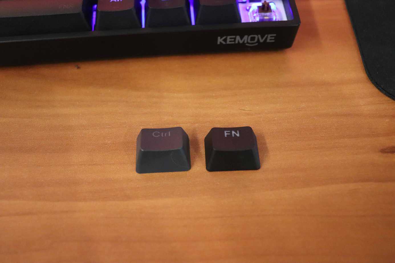 Left: Massdrop CTRL keycap, Right: DK61 keycap