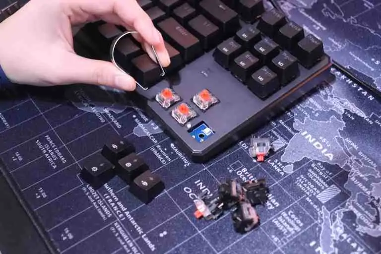 switches being removed from mechanical keyboard