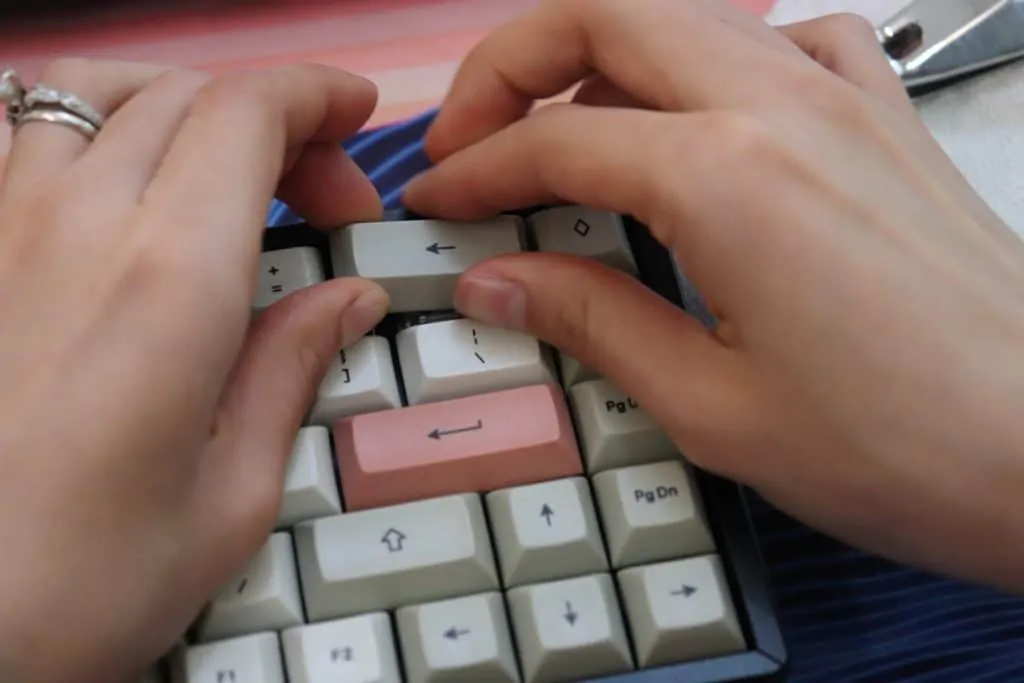 Keycap being removed from keyboard