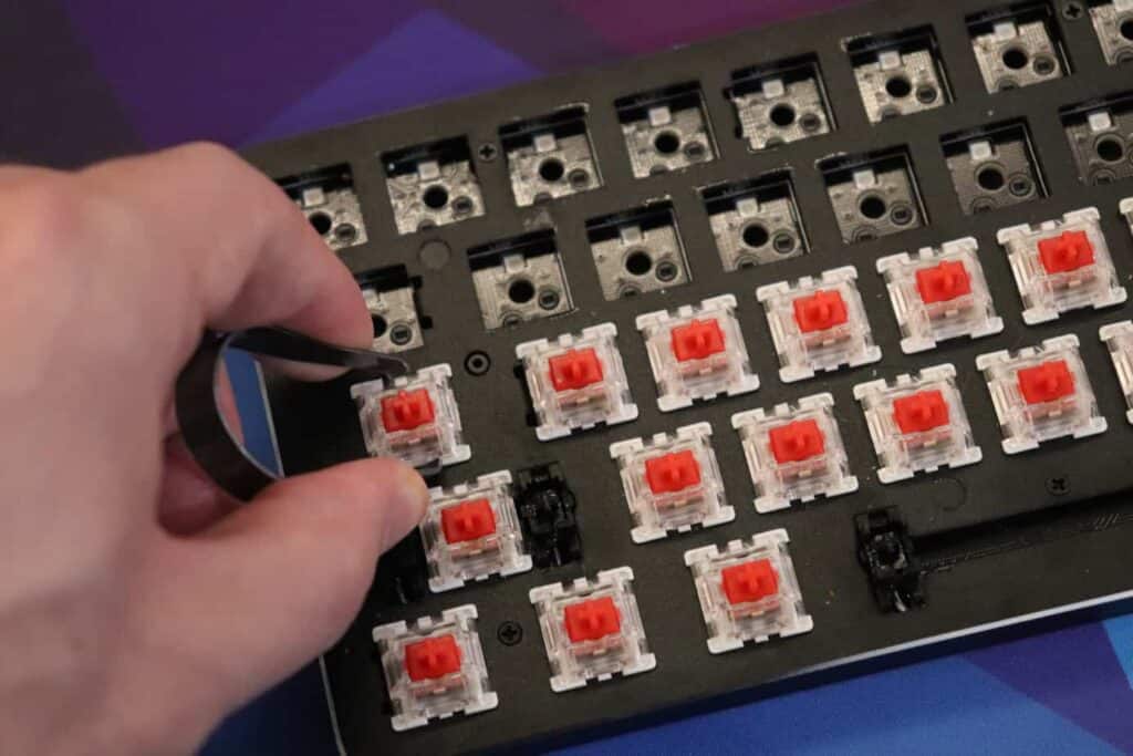 switches being removed from hot-swappable mechanical keyboard