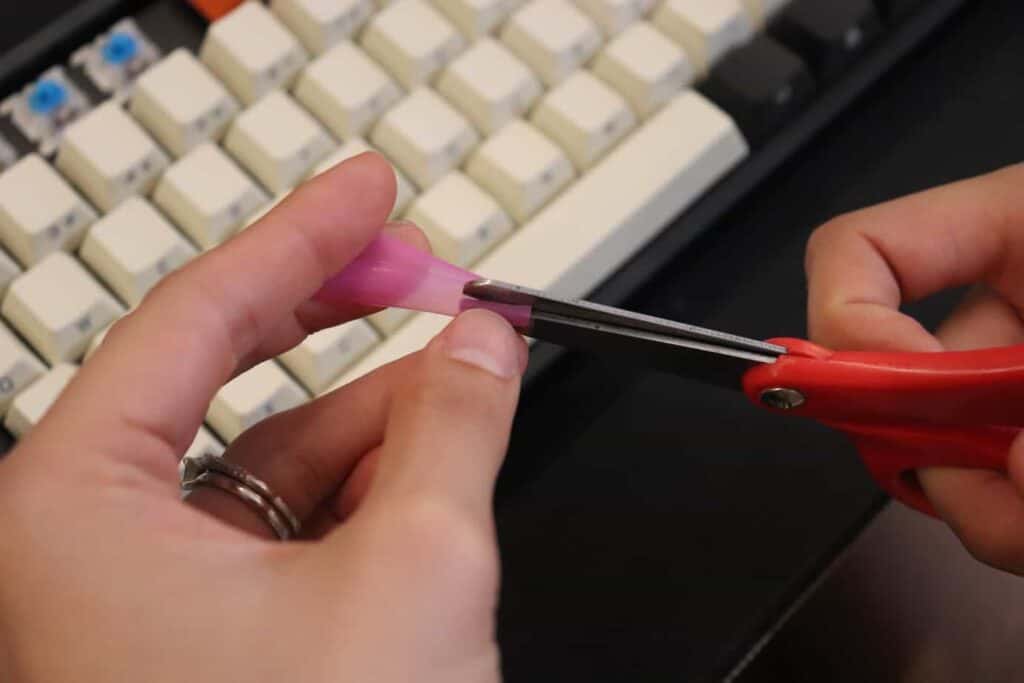 thin piece of plastic being cut