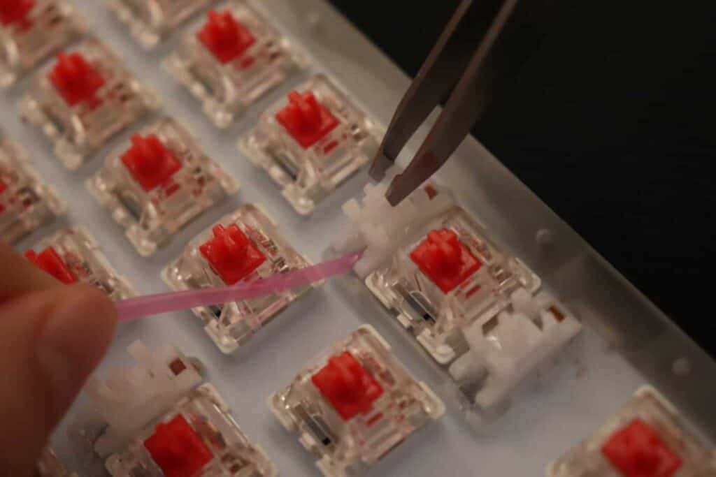 lubing stabilizer wire on soldered keyboard