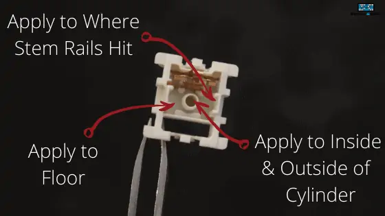 diagram explaining where to lube on the bottom housing of a mechanical switch