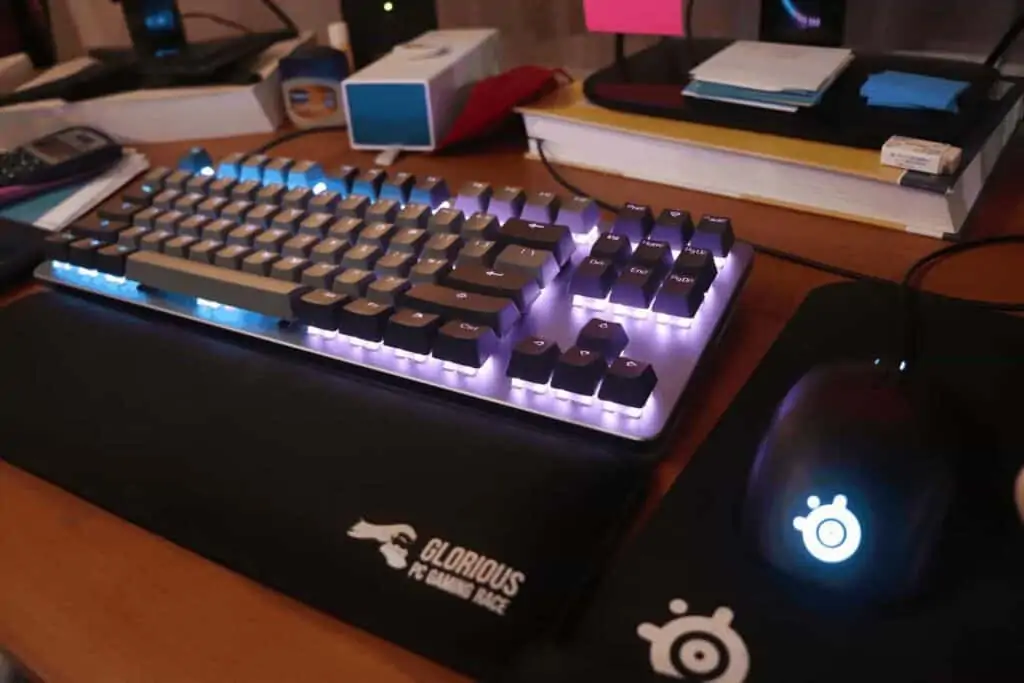 Picture of the Drop CTRL on desk with mouse and wrist rest.