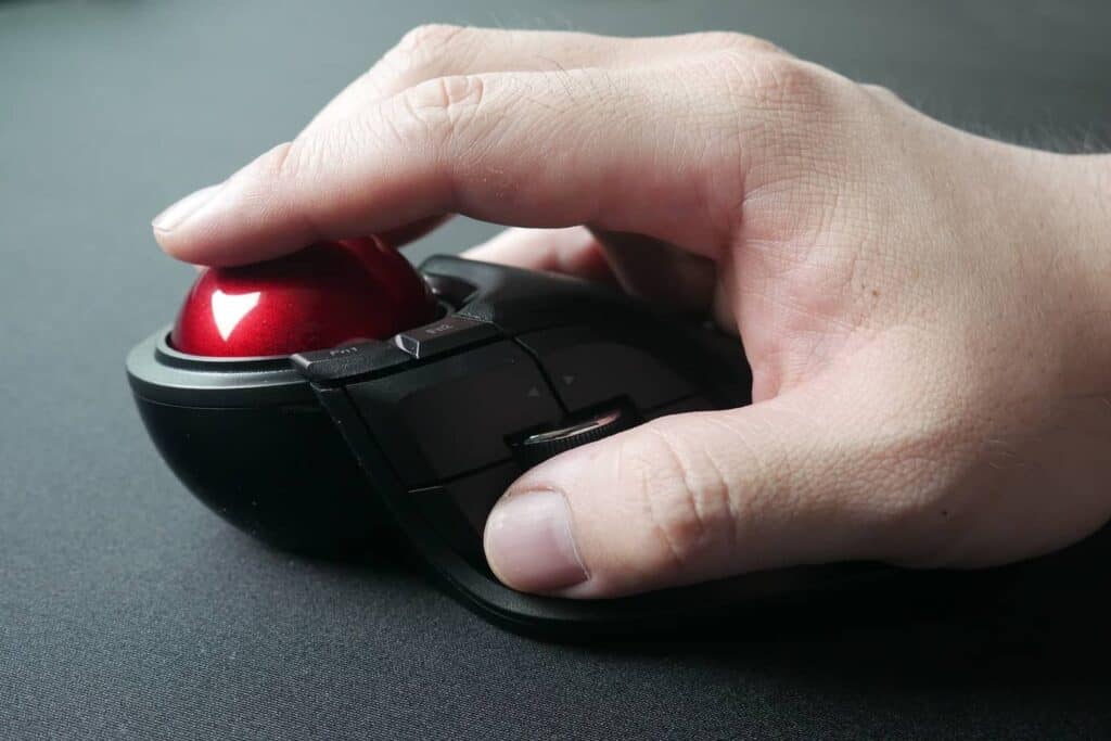 Side view of Elecom HUGE trackball mouse being used