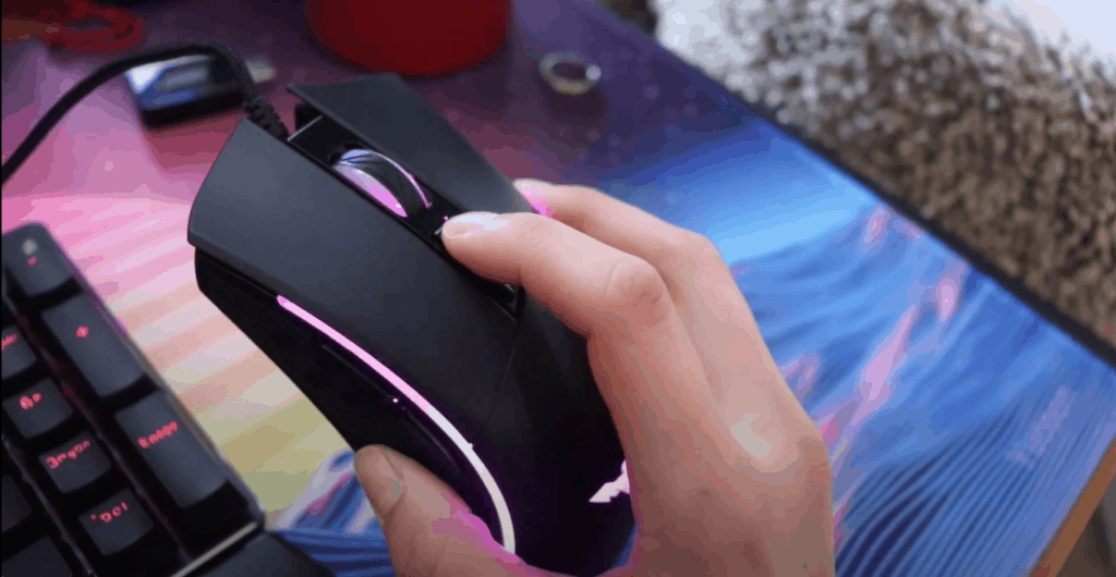 Havit Mouse in someone's hand 