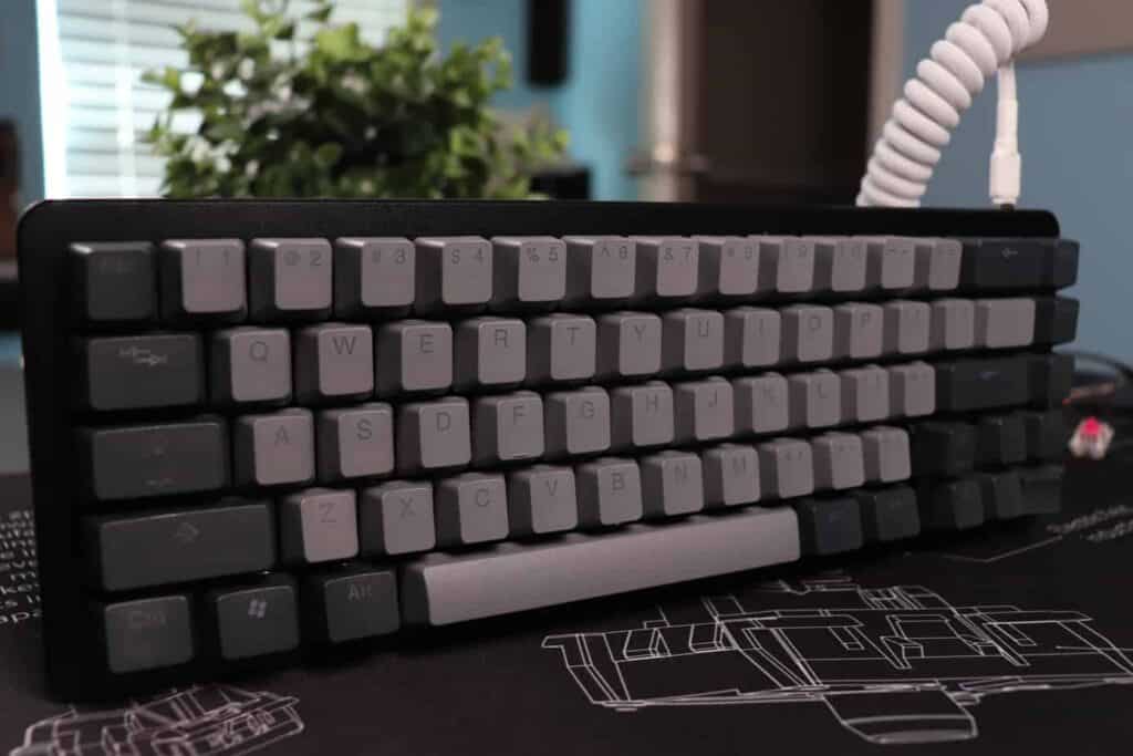  Drop Alt mechanical keyboard standing up on deskmat