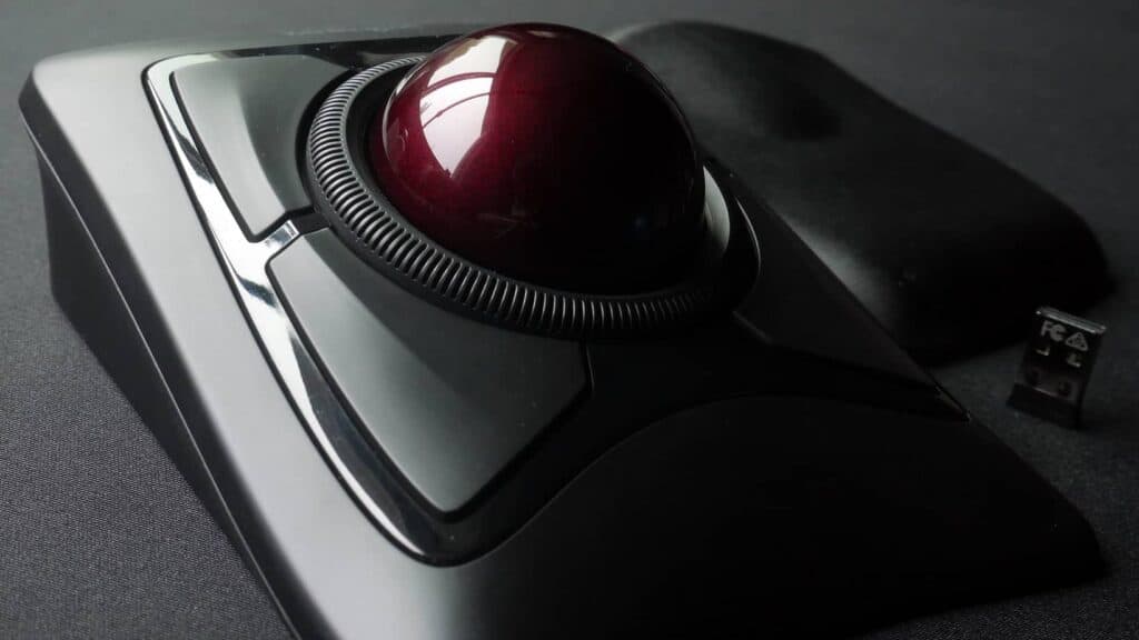 Kensington trackball mouse with red ball.