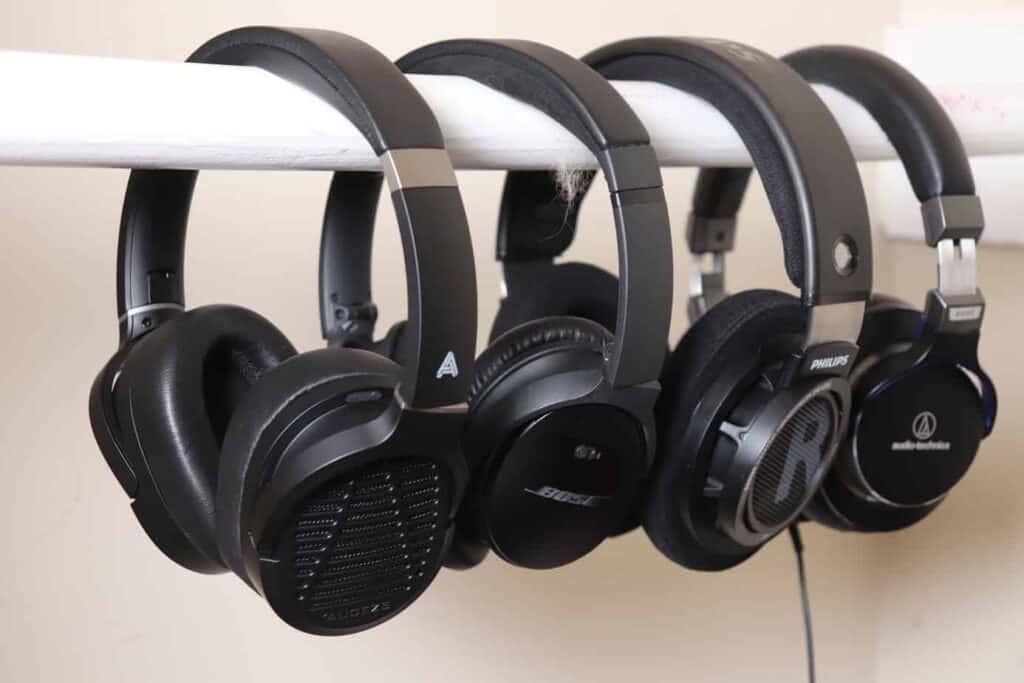 headphones hanging up next to each other 